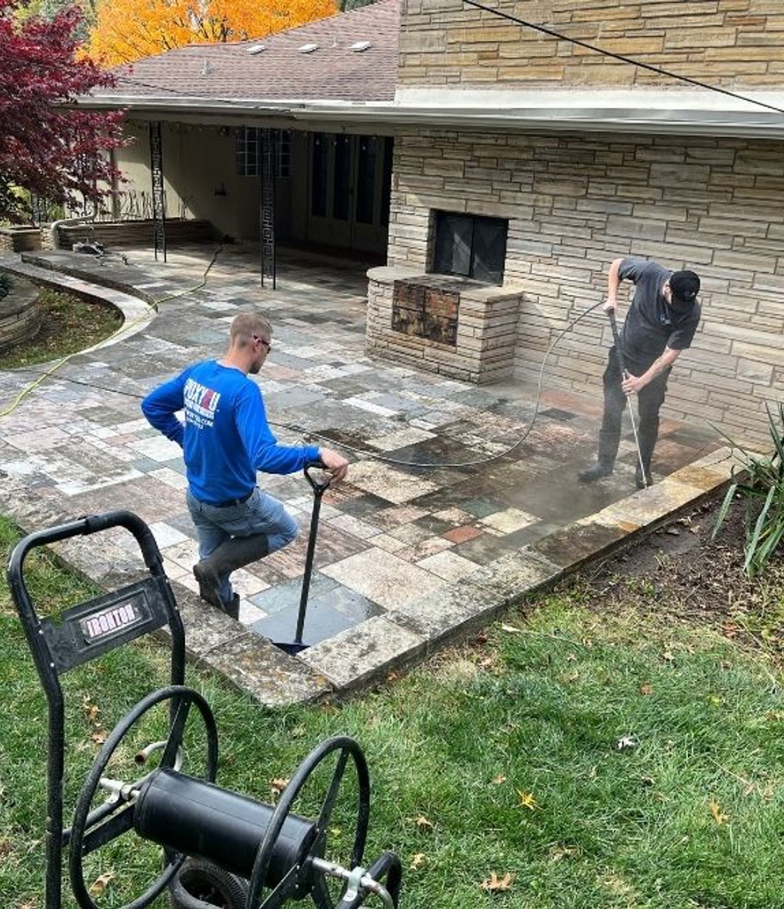 Dirty concrete patio before pressure washing in Kansas City