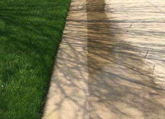 Unsightly Driveway Pressure Washed Clean